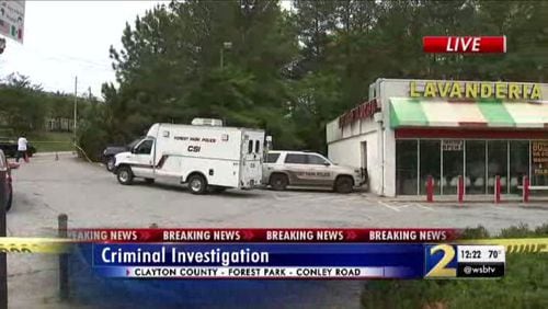 Police are investigating a body that was discovered behind a Forest Park laundromat Saturday morning.
