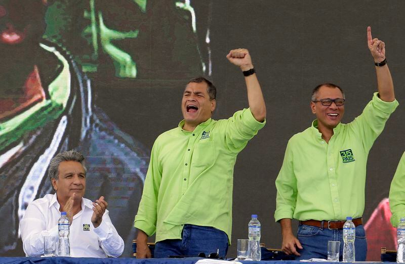 FILE - Vice President Jorge Glas, right, accompanied by former Vice President Lenin Moreno, left, and President Rafael Correa, sing during a party convention, in Quito, Ecuador, Oct. 1, 2016. Ecuadorian police broke through the external doors of the Mexican Embassy in Quito, Friday, April 6, 2024, to arrest Glas, who had been residing there since December. (AP Photo/Dolores Ochoa, File)