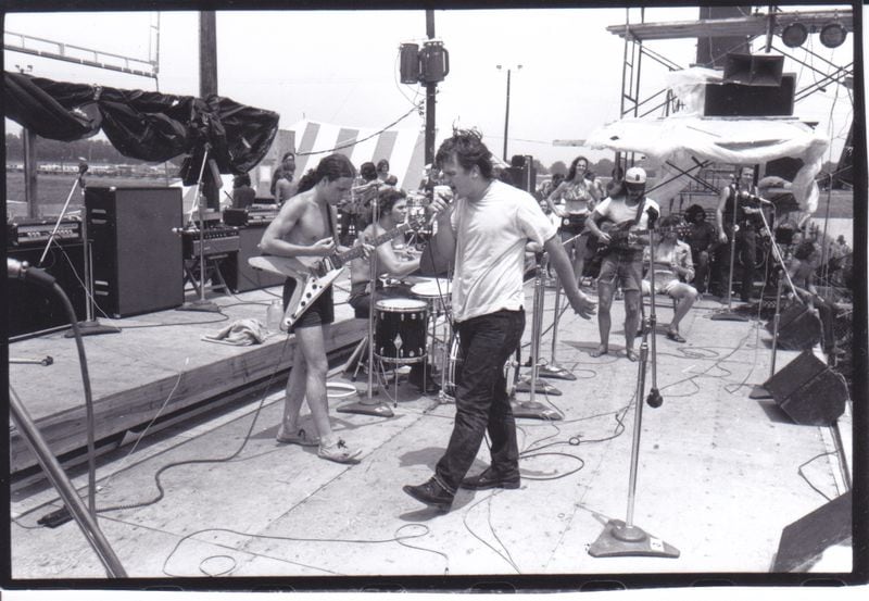 The Hampton Grease Band performed at the Atlanta Pop Festival in 1970 in Byron, Ga. Members are (l-r): Bruce Hampton (vocalist -- he didn't start calling himself "Col. Bruce" until many years after the Grease Band); Glenn Phillips (guitarist with the Flying V guitar, in shorts with no shirt and a pony tail); Jerry Fields (drummer); Mike Holbrook (bassist); Harold Kelling (guitarist). Photos: Bill Fibben