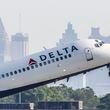 April 27, 2021. A Delta Air Lines jet takes off from Hartsfield-Jackson International Airport. (John Spink / John.Spink@ajc.com)