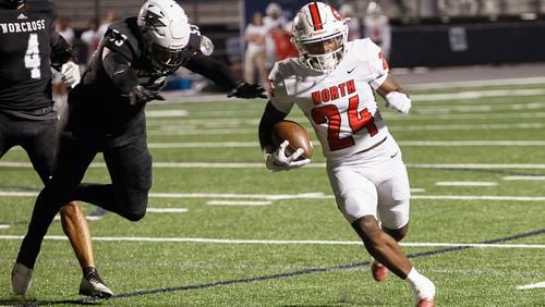 North Gwinnett running back Julian Walters (24) runs the ball during the first half of the game against Norcross High School on Friday, November 4, 2022. (Natrice Miller/natrice.miller@ajc.com)