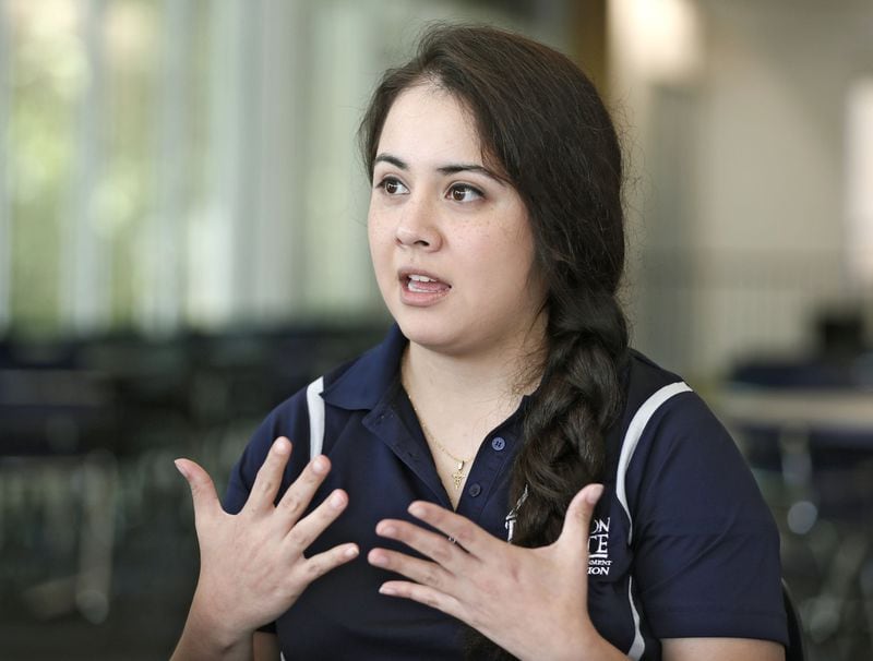 Carolina Gomez, 25, is a senior at Dalton State College. Her family moved to Dalton to work in the area’s textile mills. Gomez is president of the student government association at the college, where Hispanic immigrants and children of immigrants are excelling and graduating at rates exceeding that of other groups. Bob Andres / bandres@ajc.com