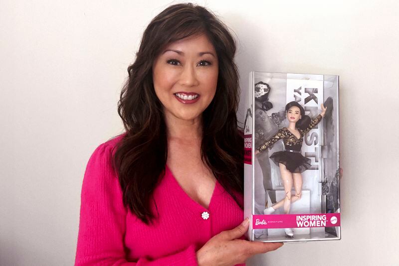 This photo provided by Mattel in April 2024 shows Kristi Yamaguchi with the company's Barbie doll based on the figure skater. Yamaguchi became the first Asian American to win an individual gold medal for figure skating at the 1992 Winter Olympics. (Mattel via AP)