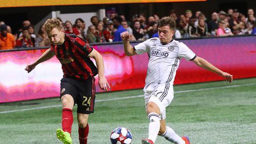 March 17, 2019 Atlanta: Atlanta United midfielder Julian Gressel makes a shot on goal past Philadelphia Union defender Kai Wagner that was blocked by goalkeeper Andre Blake during the second half in a MLS soccer match that ended in a 1-1 draw on Sunday, March 17, 2019, in Atlanta.   Curtis Compton/ccompton@ajc.com