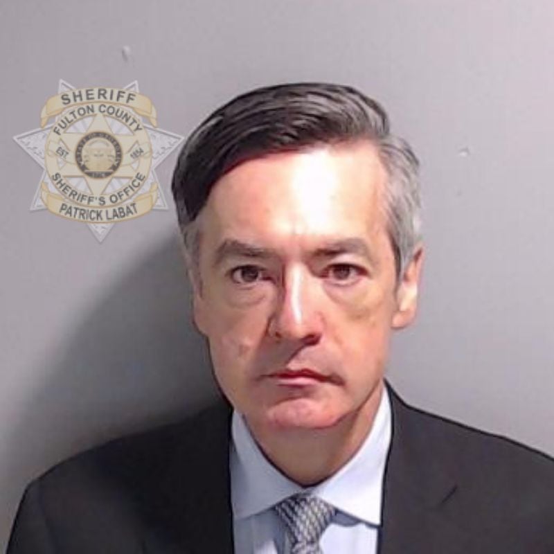 In this handout provided by the Fulton County Sheriff's Office, former Trump lawyer Kenneth Chesebro poses for his booking photo on Aug. 23, 2023 in Atlanta. Former President Donald Trump and 18 others facing felony charges in the indictment related to tampering with the 2020 election in Georgia have been ordered to turn themselves in by August 25. (Fulton County Sheriff's Office via Getty Images/TNS)