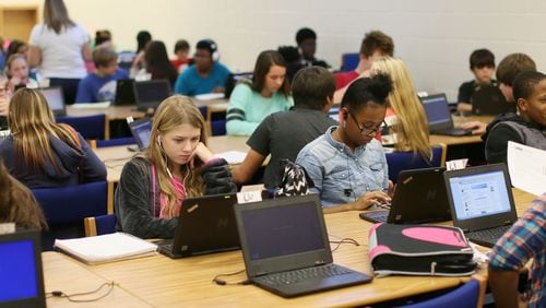 At Locust Grove Middle School in Henry County, middle school students choose their own options in coursework for meeting standards and move on to the next subject when they are ready. They do some of their work independently in large “flex labs” in order to create smaller than usual student-teacher ratios.