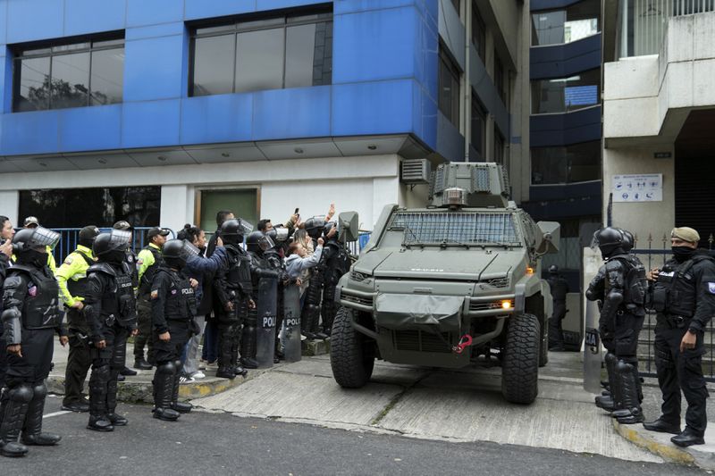 FILE - A military vehicle transports former Ecuadorian Vice President Jorge Glas from the detention center where he was held after police broke into the Mexican Embassy to arrest him in Quito, Ecuador, Saturday, April 6, 2024. Mexico is taking Ecuador to the United Nations' top court on Tuesday, April 30, 2024, accusing the nation of violating international law by storming into the Mexican embassy in Quito and arresting former Ecuador Vice President Jorge Glas, who had been holed up there seeking asylum in Mexico. (AP Photo/Dolores Ochoa, File)