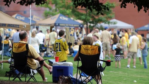 Tailgating before a Georgia Tech football game on its campus. AJC FILE PHOTO
