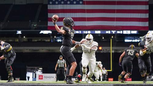 East quarterback Evan Prater (3) throws a pass facing a rush by West defensive lineman Jacobian Guillory (90) during the 2020 All-American Bowl Jan. 4, 2020 at the Alamodome in San Antonio, Texas.