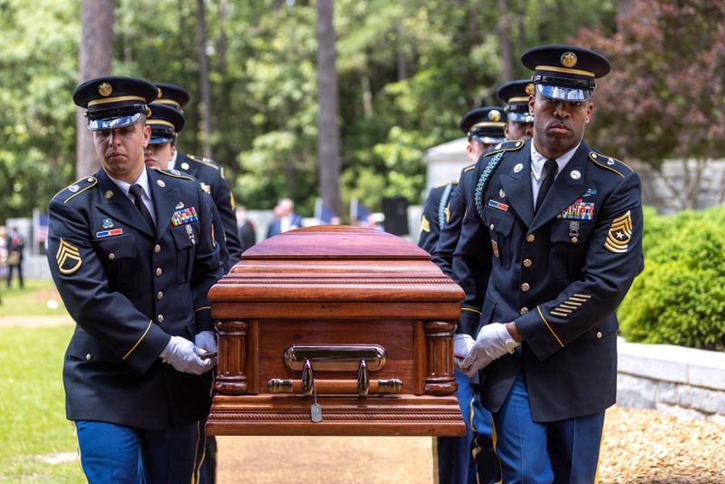Army National Guard members carry the casket of Medal of Honor recipient Luther Story, who was reintered with military honors at Andersonville National Cemetery on Memorial Day, Monday, May 29, 2023. The Korean War hero was initially unidentified and buried as an unknown soldier at the National Memorial Cemetery of the Pacific in Honolulu. (Arvin Temkar/The Atlanta Journal-Constitution)