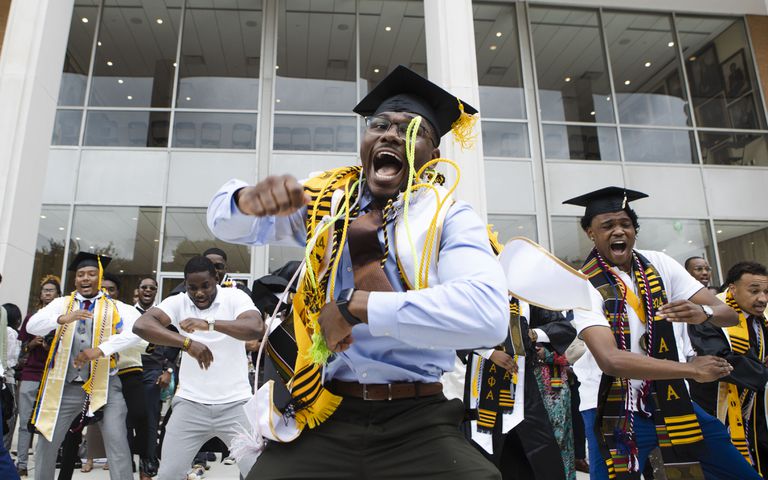 Rodney Gross leads his Alpha Phi Alpha fraternity brothers in a step routine after the Morehouse College commencement ceremony on Sunday, May 21, 2023, on Century Campus in Atlanta. The graduation marked Morehouse College's 139th commencement program. CHRISTINA MATACOTTA FOR THE ATLANTA JOURNAL-CONSTITUTION