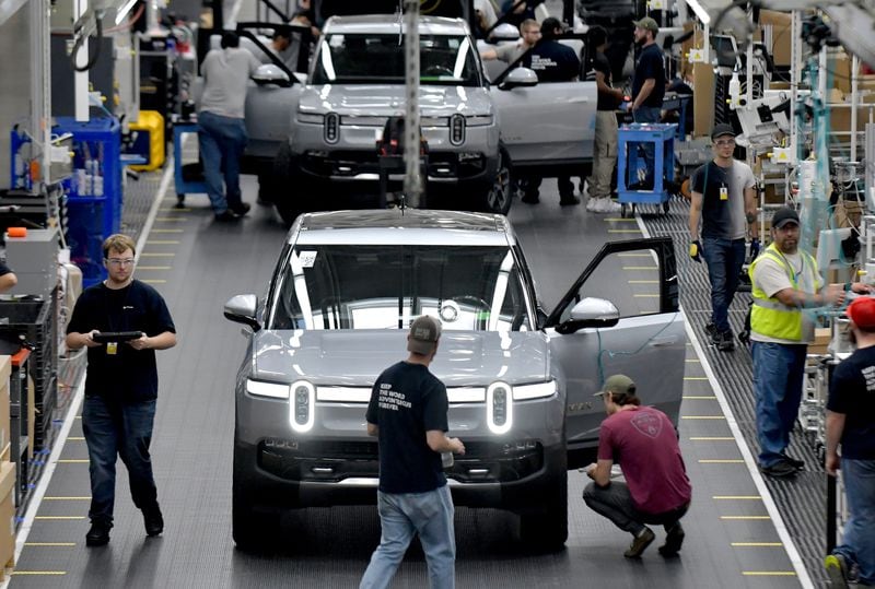 Manufacturing workers assemble electric vehicles at Rivian in Normal, Ill., on July 20, 2022. (Photo for the Atlanta Journal Constitution by Ron Johnson)
