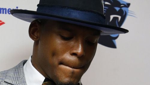 Carolina Panthers quarterback Cam Newton found it funny when a female reporter asked him a question about football terminology Wednesday. File photo