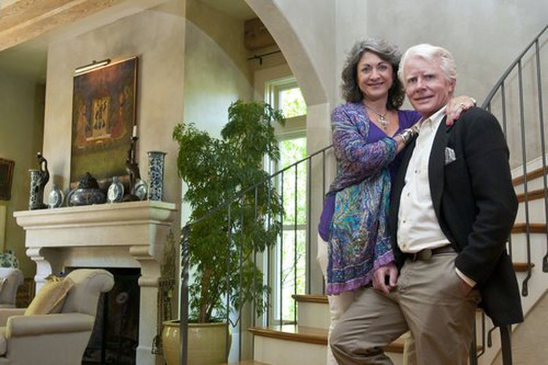 Marie and Steve Nygren stand in the foyer of their home.