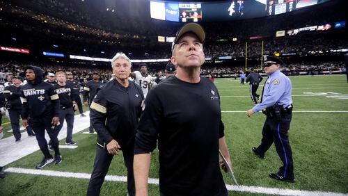 New Orleans Saints head coach Sean Payton looks up as he walks off the field after overtime of an NFL wild-card playoff football game against the Minnesota Vikings, Sunday, Jan. 5, 2020, in New Orleans. The Vikings won 26-20.