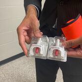 Berkmar High School Principal Durrant Williams shows Narcan nasal spray available in his school to block the effects of a drug overdose. (Josh Reyes/josh.reyes@ajc.com)