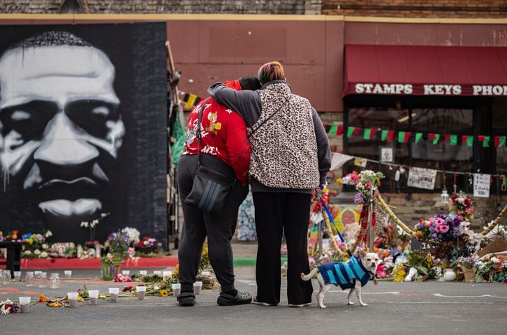 People visit the George Floyd memorial in Minneapolis on Tuesday, April 20, 2021, as  the jury continues deliberations in the Derek Chauvin trial. (Amr Alfiky/The New York Times)