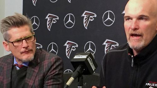 Falcons general manager Thomas Dimitroff, left and coach Dan Quinn speak Thursday, Jan. 18, 2018, in Flowery Branch, Ga. Quinn reviewed the 2017 season and said offensive coordinator Steve Sarkisian will return for the 2018 season. (AP Photo/Charles Odom)