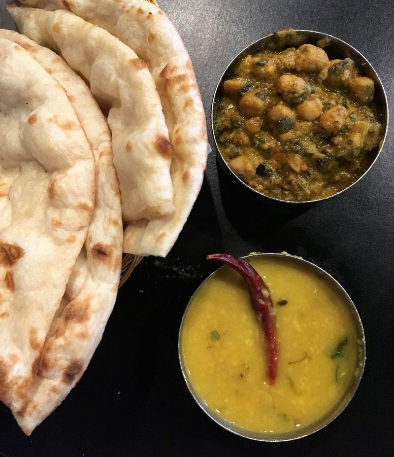 Chana palak and yellow lentil dal are just two standout vegetarian options at Bollywood Zing. CONTRIBUTED BY WYATT WILLIAMS