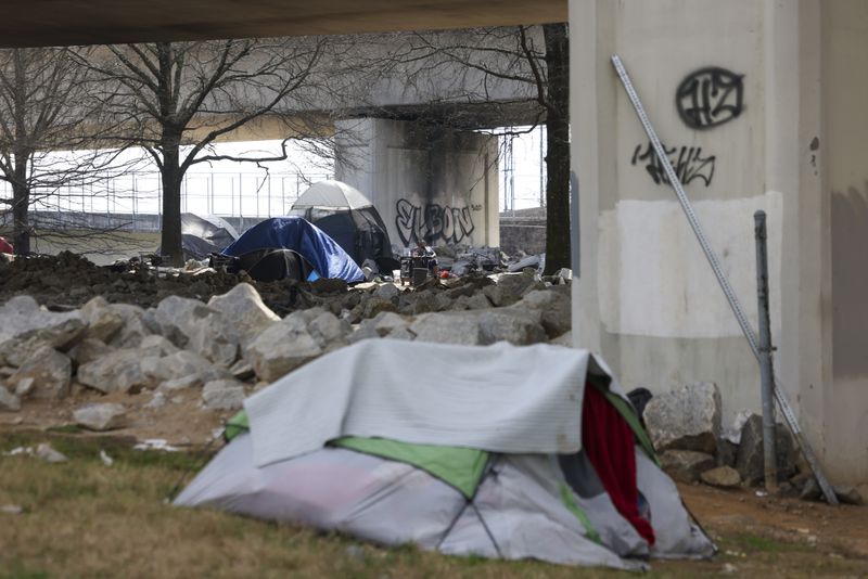 A homeless encampment is shown at Pryor Street under the I-20 overpass, Thursday, February 22, 2024, in Atlanta. (Jason Getz / jason.getz@ajc.com)