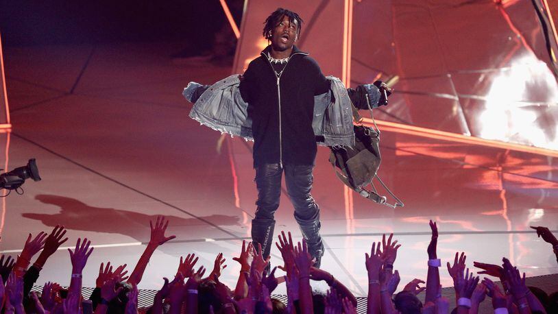 INGLEWOOD, CA - AUGUST 27:  Lil Uzi Vert performs onstage during the 2017 MTV Video Music Awards at The Forum on August 27, 2017 in Inglewood, California.  (Photo by Frederick M. Brown/Getty Images)