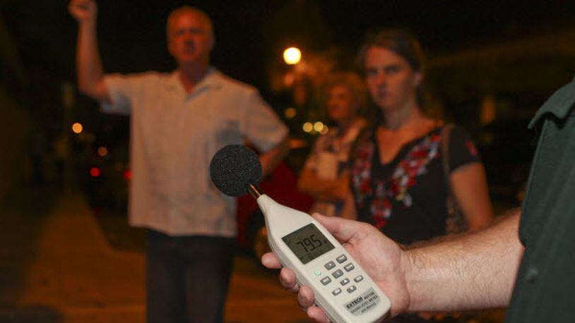 A Palm Beach County Sheriff's deputy holds up a sound meter. If proposed changes to a noise ordinance pass in Sandy Springs, the city’s police officers will have readers like this one.
