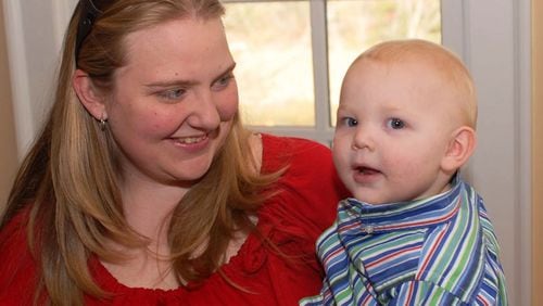 A family snapshot from 2008 shows Heather Allen Strube, left, with son Carson. On April 26, 2009, Strube was shot and killed in the parking lot of a Snellville Target moments after a custody exchange.