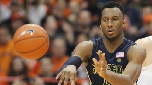 Georgia Tech’s Josh Okogie passes the ball in the second half of an NCAA college basketball game against Syracuse in Syracuse, N.Y., Saturday, March 4, 2017. Syracuse won 90-61. (AP Photo/Nick Lisi)