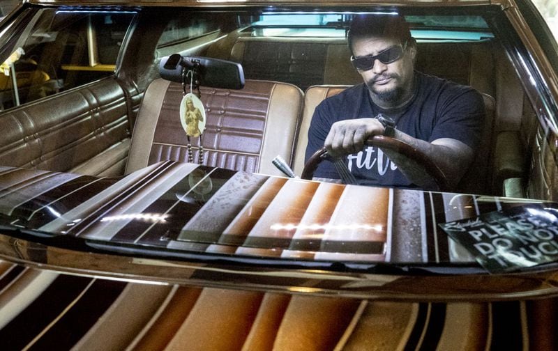 Alfredo “Freddy” Quintero and his custom 1975 Chevy Impala are headed to the Hot Wheels Tour Grand Finale in Vegas, where the winner will be inducted into the Hot Wheels Garage of Legends. Bob Andres/robert.andres@ajc.com