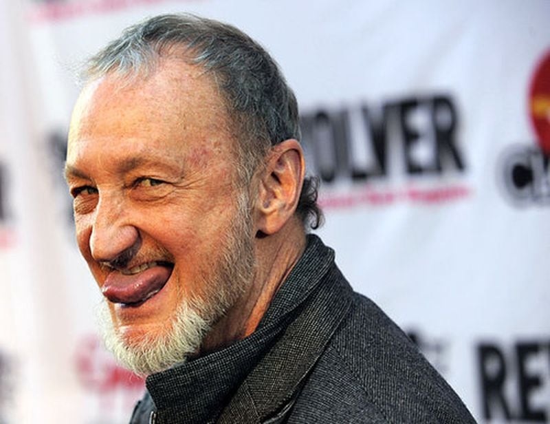 Actor Robert Englund, recipient of the Honorary Headbanger of the Year award, mugs for photographers.