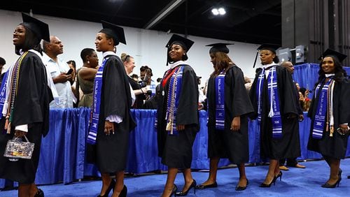 Graduates wait to take their seats at the 132nd Spelman College commencement ceremony on Sunday, May 19,  2019, at the Georgia International Convention Center. (Photo: ELIJAH NOUVELAGE/SPECIAL TO THE AJC)