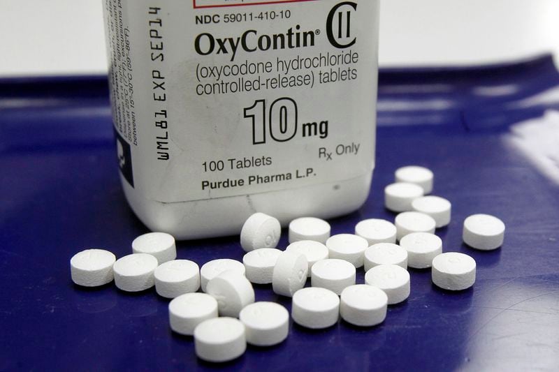 OxyContin pills. Fulton County is suing the maker of OxyContin and other drug manufacturers. (AP Photo/Toby Talbot, File)