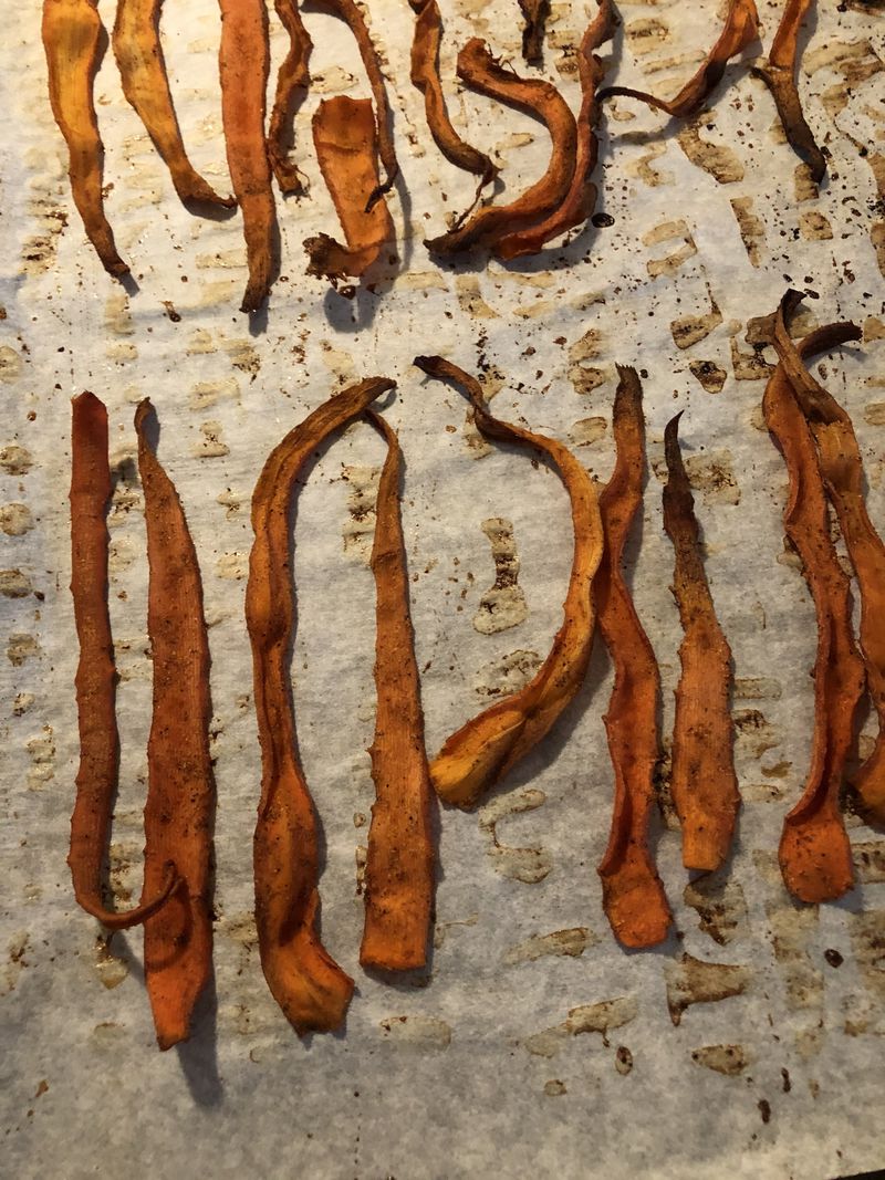When the carrot bacon cooks, it twists and curls like pork bacon. (C.W. Cameron for The Atlanta Journal-Constitution)