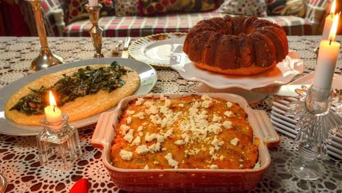 Coconut Grits with Coconut-Braised Collards; Pastelon de Plantano (the casserole); and Mami’s Bizcocho de Ron (Rum Cake). Styling by CW Cameron. CHRIS HUNT/SPECIAL