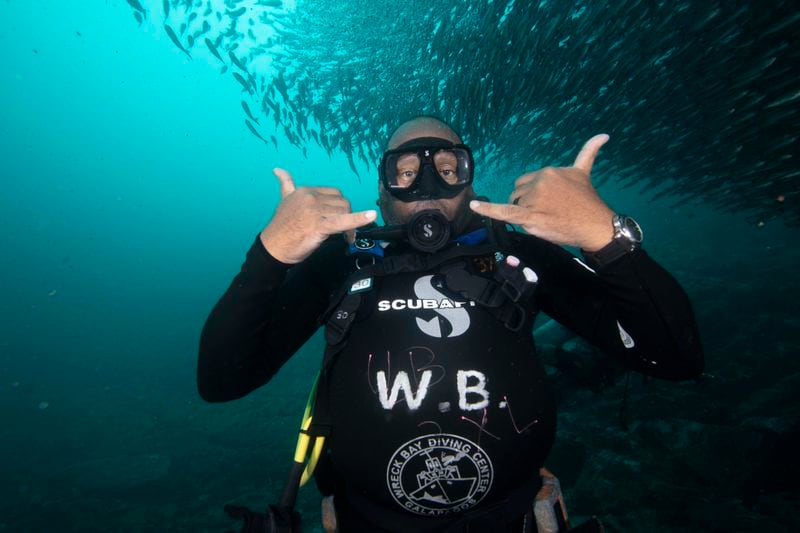 Frank Ski photographed under water while diving during one of his foundation's annual environmental education tours.