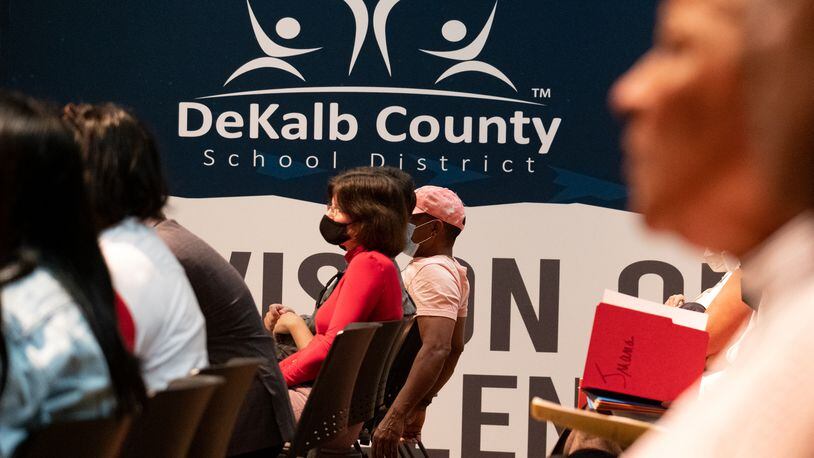 Members of the public listen during the DeKalb County Board of Education meeting on May 9, 2022, at the school district's headquarters in Stone Mountain, Georgia. Several people criticized the board for not supporting modernization of Druid Hills High School. Ben Gray for The Atlanta Journal-Constitution