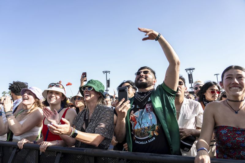 Festivalgoers are seen during the the first weekend of the Coachella Valley Music and Arts Festival at the Empire Polo Club on Saturday, April 13, 2024, in Indio, Calif. (Photo by Amy Harris/Invision/AP)