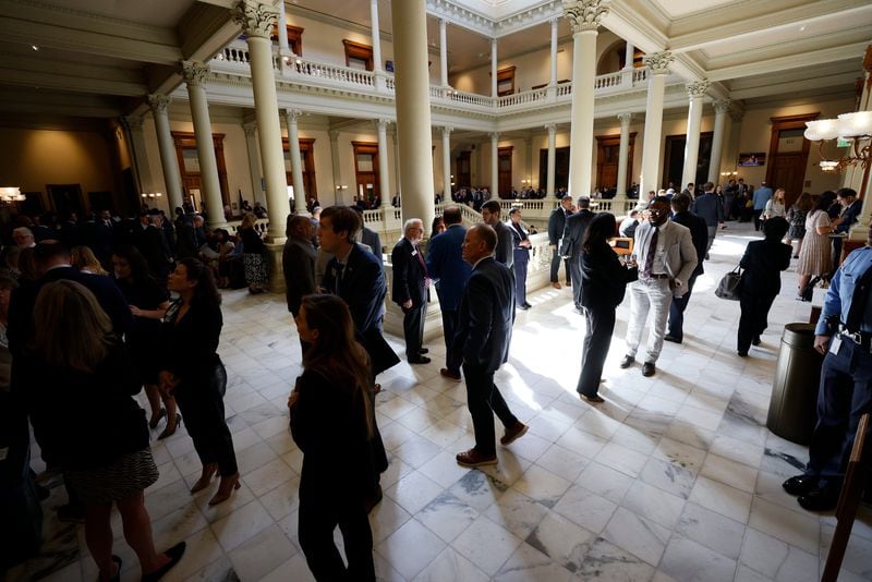 Lobbyists and lawmakers gather in the hallways of the Georgia Capitol. (Miguel Martinez/The Atlanta Journal-Constitution/TNS)