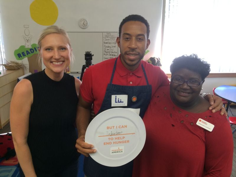 Ludacris with Feeding America’s Allie Mabbott, left, and the Atlanta Community Food Bank’s Chaundra Luckett. Photo: Jennifer Brett