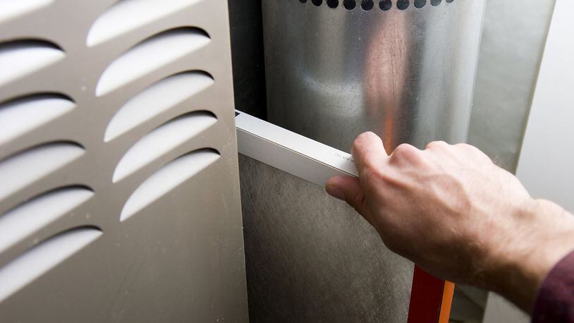 By installing your filter backwards, air will have a harder time flowing through the filter and your air handler will have to work harder to make up for the loss of airflow. (Brad Calkins/Dreamstime/TNS)