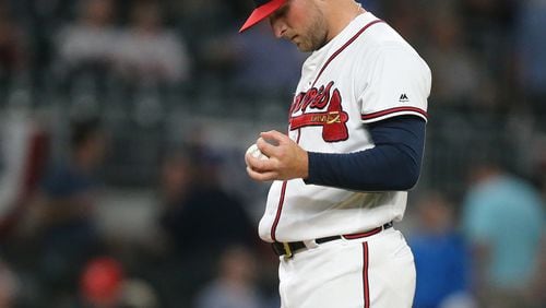 Braves lefty Ian Krol reacts after giving up a grand slam to the Nationals’ Ryan Zimmerman on April 19. (Curtis Compton/ccompton@ajc.com)