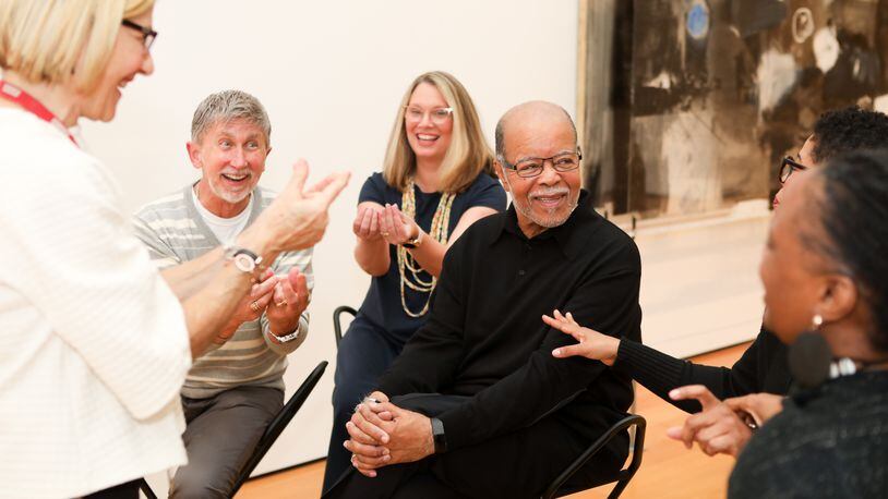 Docent Bryan Brooks (center) leads a Lifelong Learning group in conversation at the High Museum of Art. (Photo by CatMax Photography)