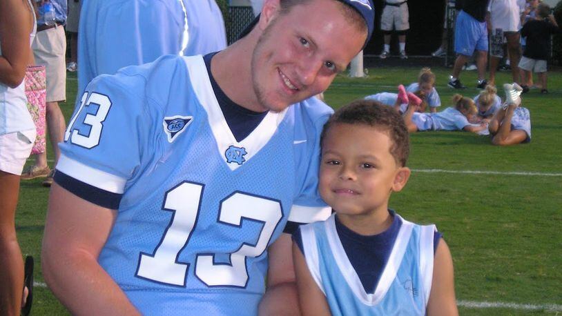 As a boy, Georgia Tech quarterback Jordan Yates once surprised his uncle T.J. Yates, then a quarterback at North Carolina, by showing up to a fan day event at North Carolina in 2007. (Photo courtesy Yates family)