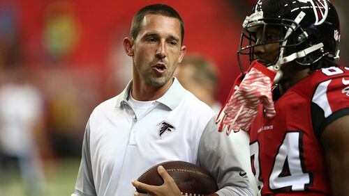 Former Falcons wide receiver Roddy White claims offensive coordinator Kyle Shanahn (left) wanted him off the team since his arrival on January 2015.