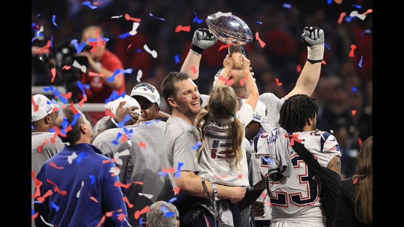 Matthew Slater #18 of the New England Patriots holds the Vince Lombardi Trophy at the end of the Super Bowl LIII at Mercedes-Benz Stadium.  (Photo by Streeter Lecka/Getty Images)