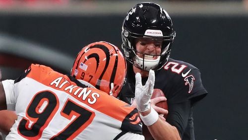 Cincinnati Bengals defensive tackle Geno Atkins sacks Falcons quarterback Matt Ryan during the first half Sunday, Sept 30, 2018, in Atlanta.