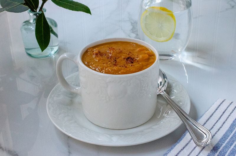 Warm spices and red pepper flakes give this mug of sweet potato soup a kick. Food styling by Cynthia Graubart
(Virginia Willis for The Atlanta Journal-Constitution)