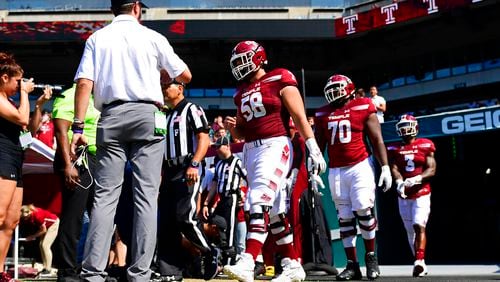 Temple offensive lineman Matt Hennessy (58) walks onto the field before an NCAA football game against Bucknell at Lincoln Financial Field on Saturday, Aug. 31, 2019 in Philadelphia. (AP Photo/Corey Perrine)