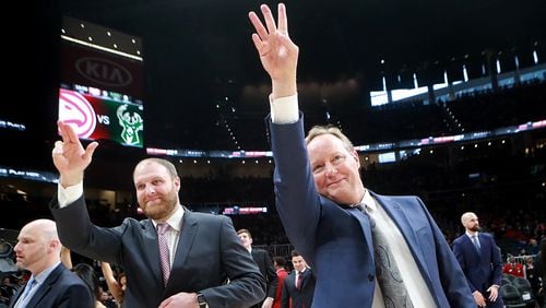 Former Atlanta Hawks head coach Mike Budenholzer waves to players and fans as he returns as the Milwaukee Bucks head coach during the first half in a NBA basketball game at State Farm Arena on Sunday, Jan. 13, 2019, in Atlanta.    Curtis Compton/ccompton@ajc.com