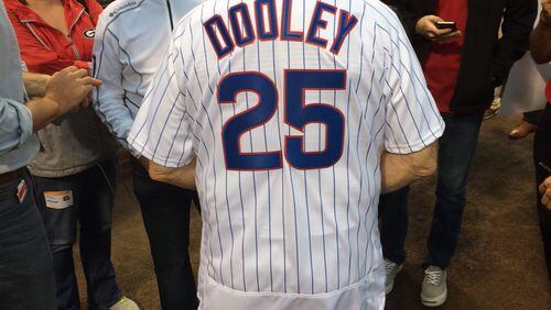 That's Dooley, as in former Bulldogs coach Vine, modeling his new Cubs jersey. (Steve Hummer, AJC)